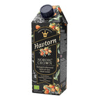 Svart kartong med havtornsdryck 750 ml från Nordic Crown, med bild på orange havtornsbär, mot vit bakgrund.