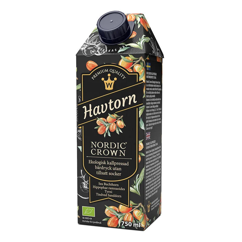 Svart kartong med havtornsdryck 750 ml från Nordic Crown, med bild på orange havtornsbär, mot vit bakgrund.