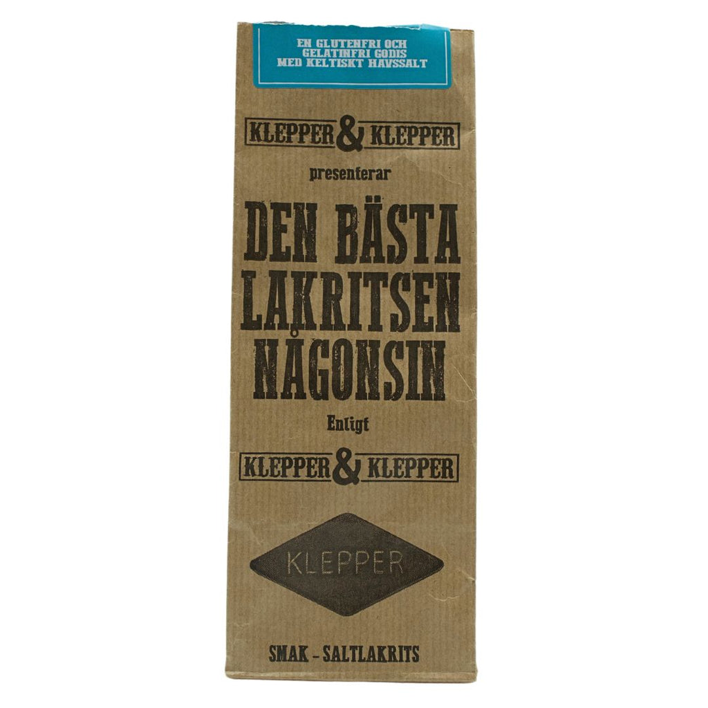 Brun papperspåse från Klepper & Klepper med texten Den bästa lakritsen någonsin och Smak saltlakrits, mot vit bakgrund.