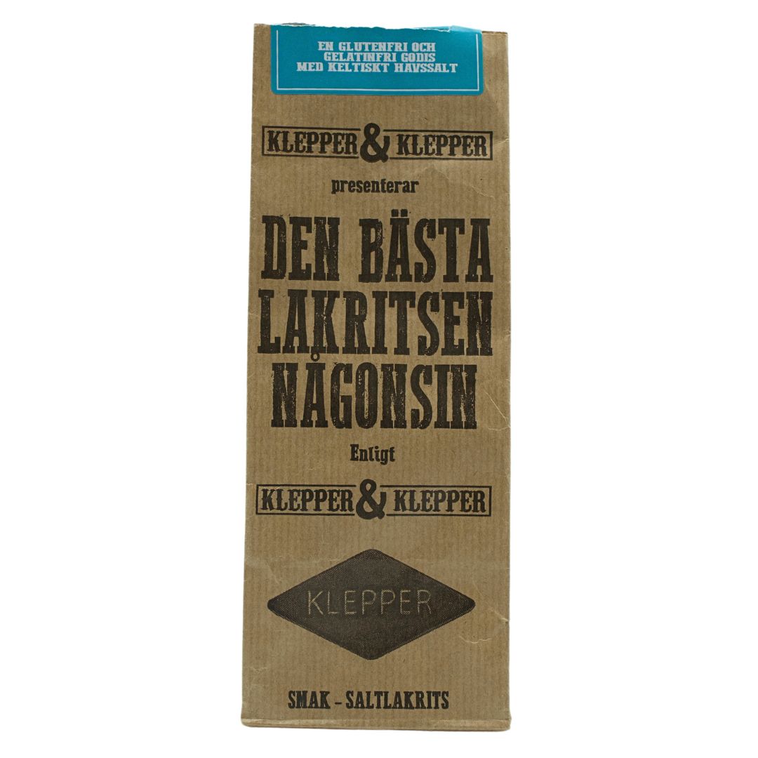 Brun papperspåse från Klepper & Klepper med texten Den bästa lakritsen någonsin och Smak saltlakrits, mot vit bakgrund.
